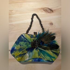 Aria Mary Frances tie dye green clutch bag with peacock feather and crystals